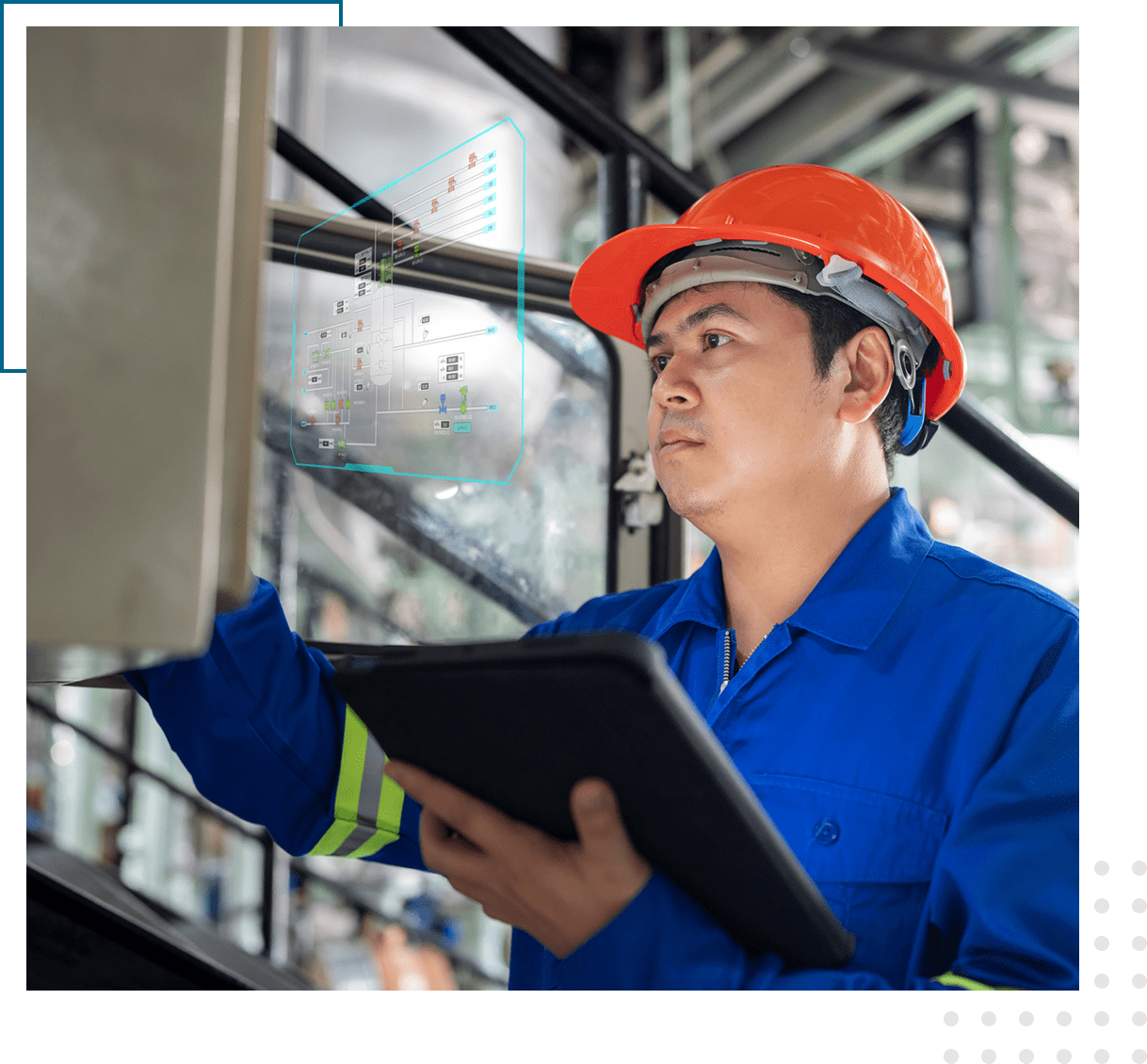 Engineer inspecting machinery with a digital tablet.